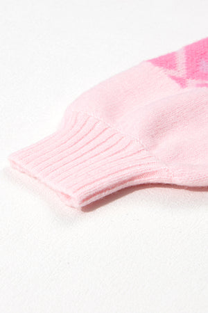 Pink acrylic knit sweater with geometric pattern and ribbed cuff detail.