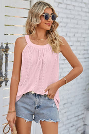 Blush pink eyelet halter tank top with gathered neckline and casual fit.