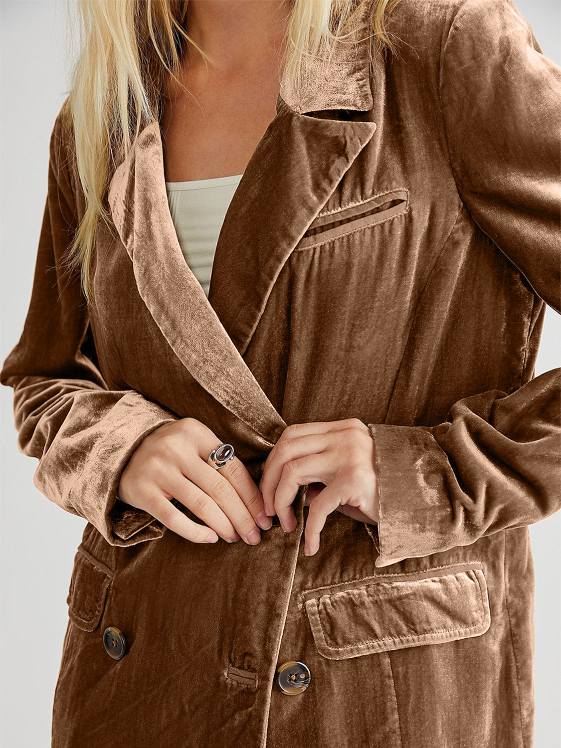 Camel velvet double-breasted blazer with patch pockets and button closure.