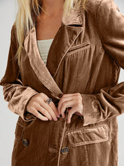 Camel velvet double-breasted blazer with patch pockets and button closure.