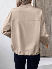 Nylon bomber jacket in beige with drawstring hem and relaxed fit.