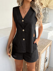 Black linen vest with side slits and button front, paired with matching shorts.