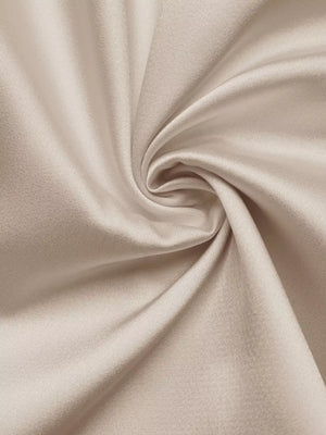 Lustrous beige V-neck maxi dress fabric detail with spaghetti straps.