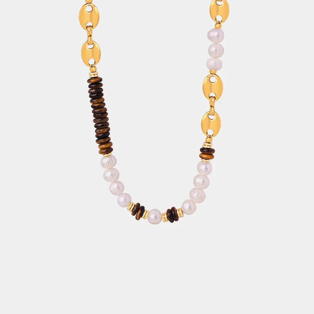 Gold pearl and tiger eye statement necklace with oval chain links