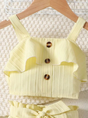 Light yellow ribbed toddler set with ruffled top and button detail.