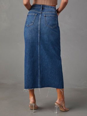 Slit-front denim midi skirt in dark blue with raw hem and buttoned closure.