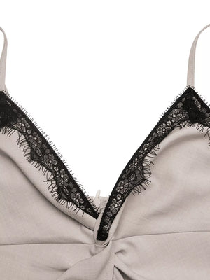 Luxe cami top in light grey with black lace trim and twisted detail.