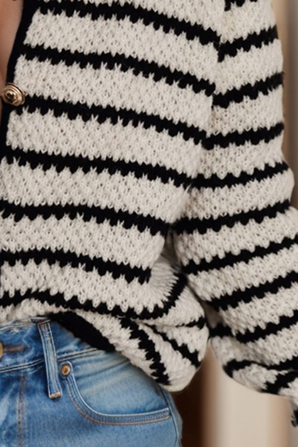 Textured Breton button-down cardigan in stripe pattern with gold button detail.