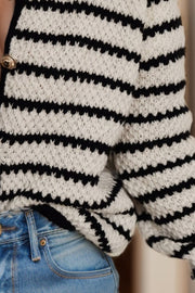 Textured Breton button-down cardigan in stripe pattern with gold button detail.
