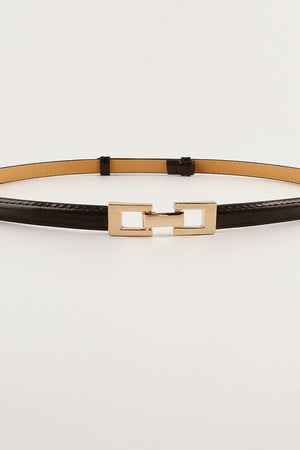 Black leather belt with gold geometric buckle detail