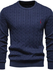 Navy cable knit crewneck sweater with red embroidered detail