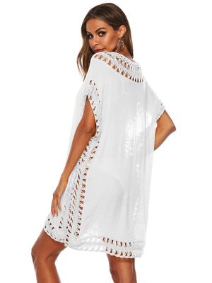 White crochet trimmed kaftan cover-up with short sleeves and bohemian detail.