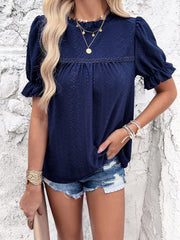 Dark Blue eyelet blouse with ruffled puff sleeves and neckline.