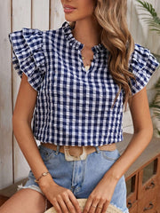 Gingham ruffle sleeve blouse in Royal Blue with a textured crinkle fabric and ruffled neckline.