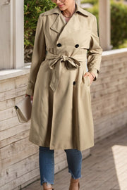 Classic trench coat in Dust Storm with a bow-tie waist and double-breasted buttons.