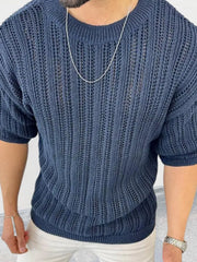 Navy open-knit crew neck sweater with boxy fit and short sleeves.