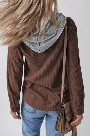 Brown corduroy shirt jacket with contrast gray hood and button cuffs.