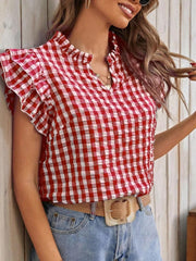 Gingham ruffle sleeve blouse in red and white with a ruffled neckline.