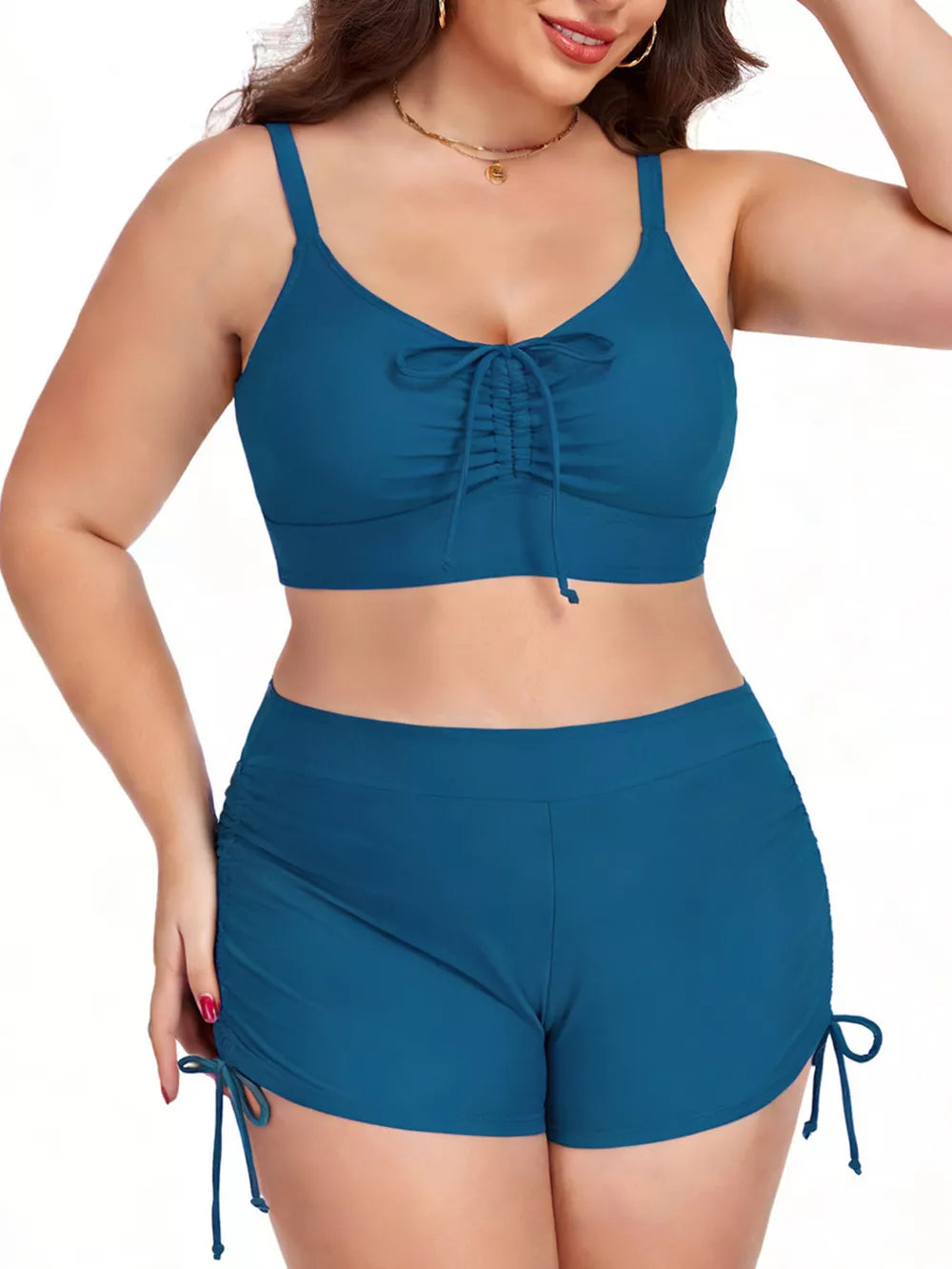 Plus size Peacock Blue adjustable drawstring swimwear set with ruched front bikini top and tie-side shorts.