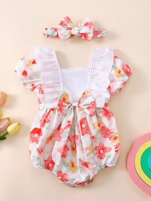 Floral print baby bodysuit with ruffled sleeves and bow, includes matching headband.