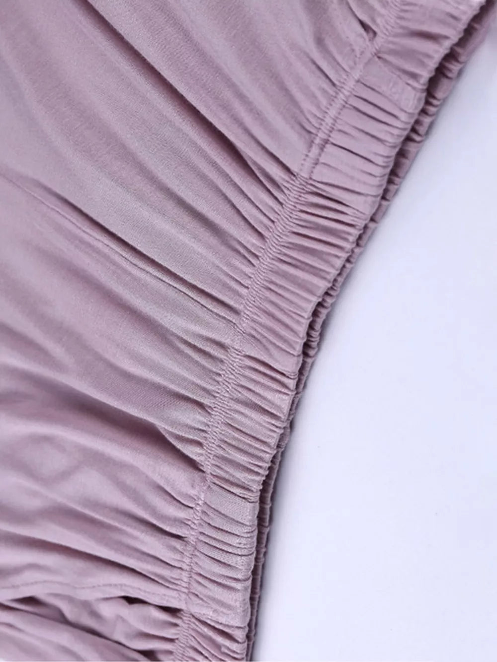 Pajama shorts detail in Bean Paste Powder with gathered elastic waistband and soft fabric.