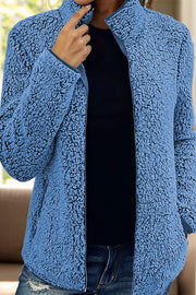 Teddy fleece zip-up jacket in Royal Blue with a stand-up collar and zippered closure.