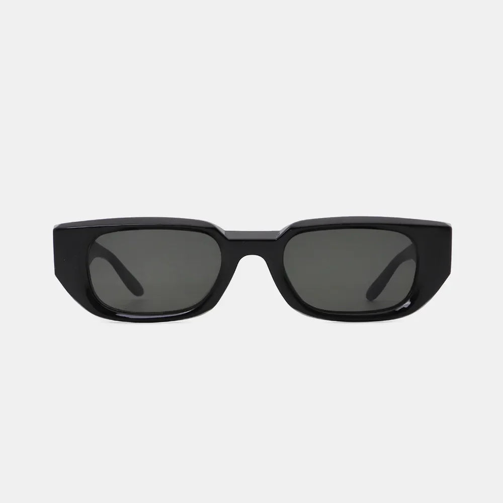 Black smoked acetate angular sunglasses with dark lenses.