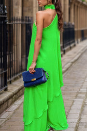 Green asymmetric drape wide-leg choker set with tiered pants and a halter neckline.