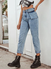 Light wash barrel leg jeans with unique pocket detail and cuffed hems.