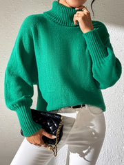 Dark Green balloon sleeve turtleneck sweater with ribbed collar and cuffs.