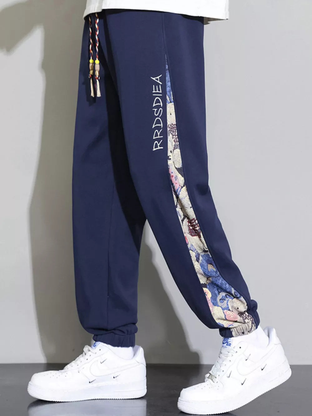 Men's Plus Size Bear Print Sweatpants in Tan, model styling view