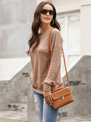 Camel henley-inspired drop shoulder sweatshirt with long sleeves and a relaxed fit.
