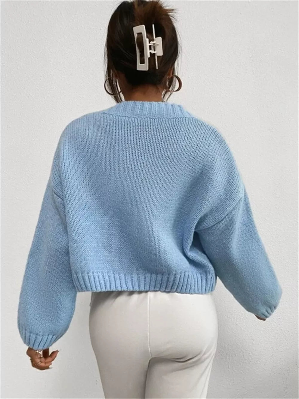 Light blue acrylic button cardigan with cloud pattern and balloon sleeves.