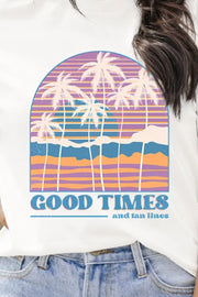 White graphic t-shirt with a retro beach sunset scene and "Good Times and tan lines" text.