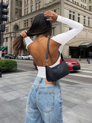 White ribbed long sleeve top with open back detail