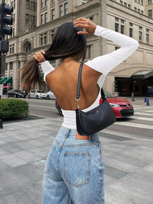 White ribbed long sleeve top with open back detail