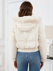 White puffer jacket with faux fur trim hood and elasticated hem.