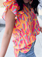 Neon abstract ruffle sleeve blouse in multicolor with a V-neck.