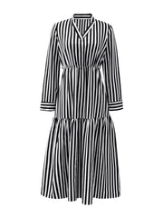 Notched long-sleeve midi dress in black and white stripes with a tiered skirt.