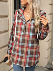 Plaid henley hooded shirt in coffee brown with red and blue plaid, buttoned neckline and white drawstrings.