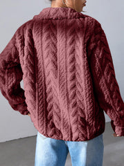 Burgundy textured chevron fleece zip jacket with a collared neckline.