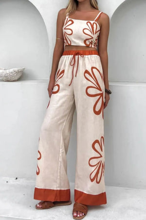 Floral print linen co-ord set with crop top and wide leg pants in ochre and burnt orange.