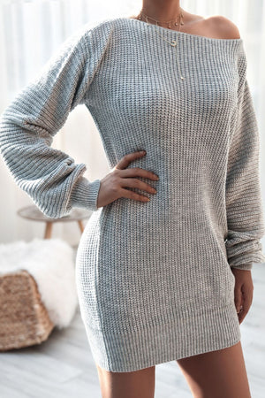 Gray ribbed knit off-the-shoulder mini dress with long sleeves and a boat neckline.
