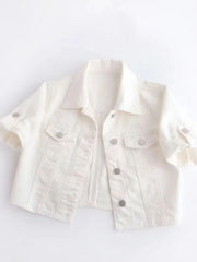 White denim cropped jacket with rolled sleeves and silver buttons