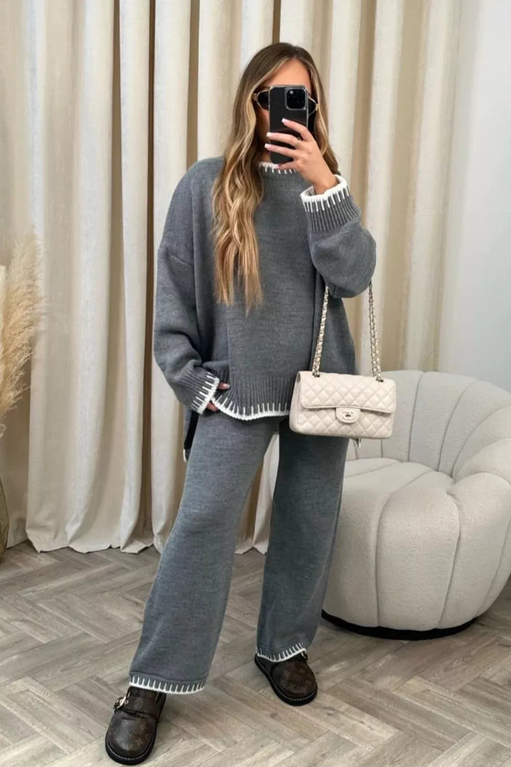 Gray relaxed fit sweater set with contrast trim details on neckline, cuffs, and hem.