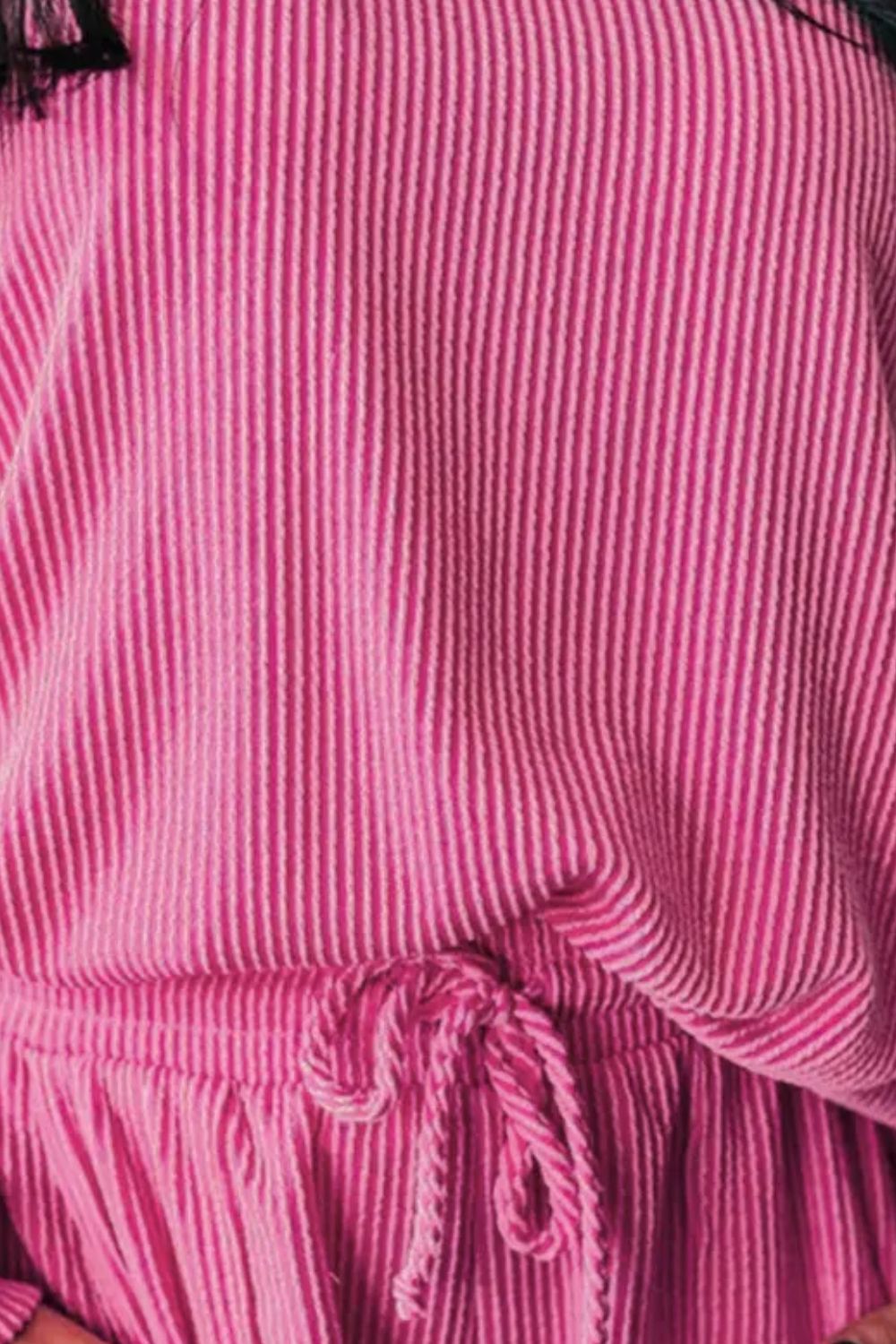Ribbed lounge set in fuchsia pink with a drawstring waist detail.