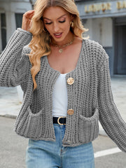 Gray chunky knit cardigan with gold buttons and pockets