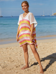 Rainbow stripe crochet beach poncho with V-neck and short sleeves, made of 100% polyester.