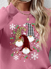 Blush pink raglan sweatshirt with festive gnome graphic and winter holiday icons.