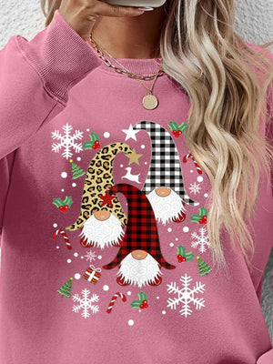 Blush pink raglan sweatshirt with festive gnome graphic and winter holiday icons.